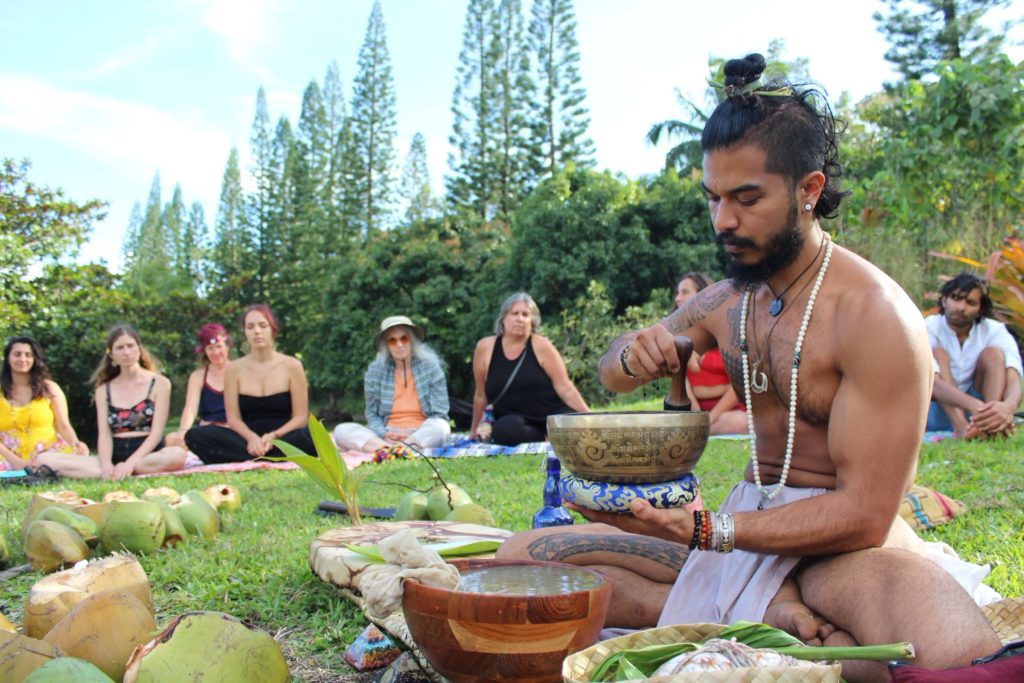 A Hawaiian Kahuna doing a ceremony at the lawns of Kalani