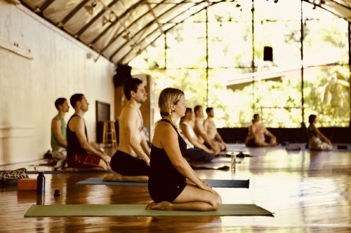 participants enjoy a yoga class.